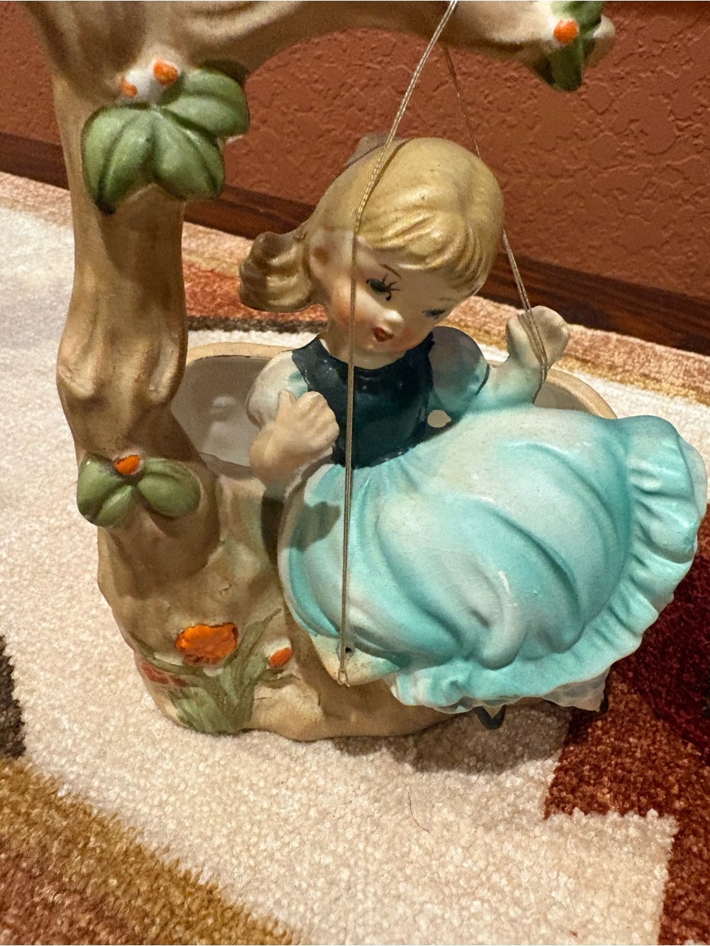 Source Unknown Blue Ceramic Girl on Swing Figurine